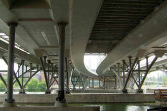 Concrete bridge from below with construction