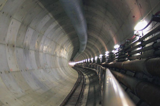 Interior view of a tunnel with rails